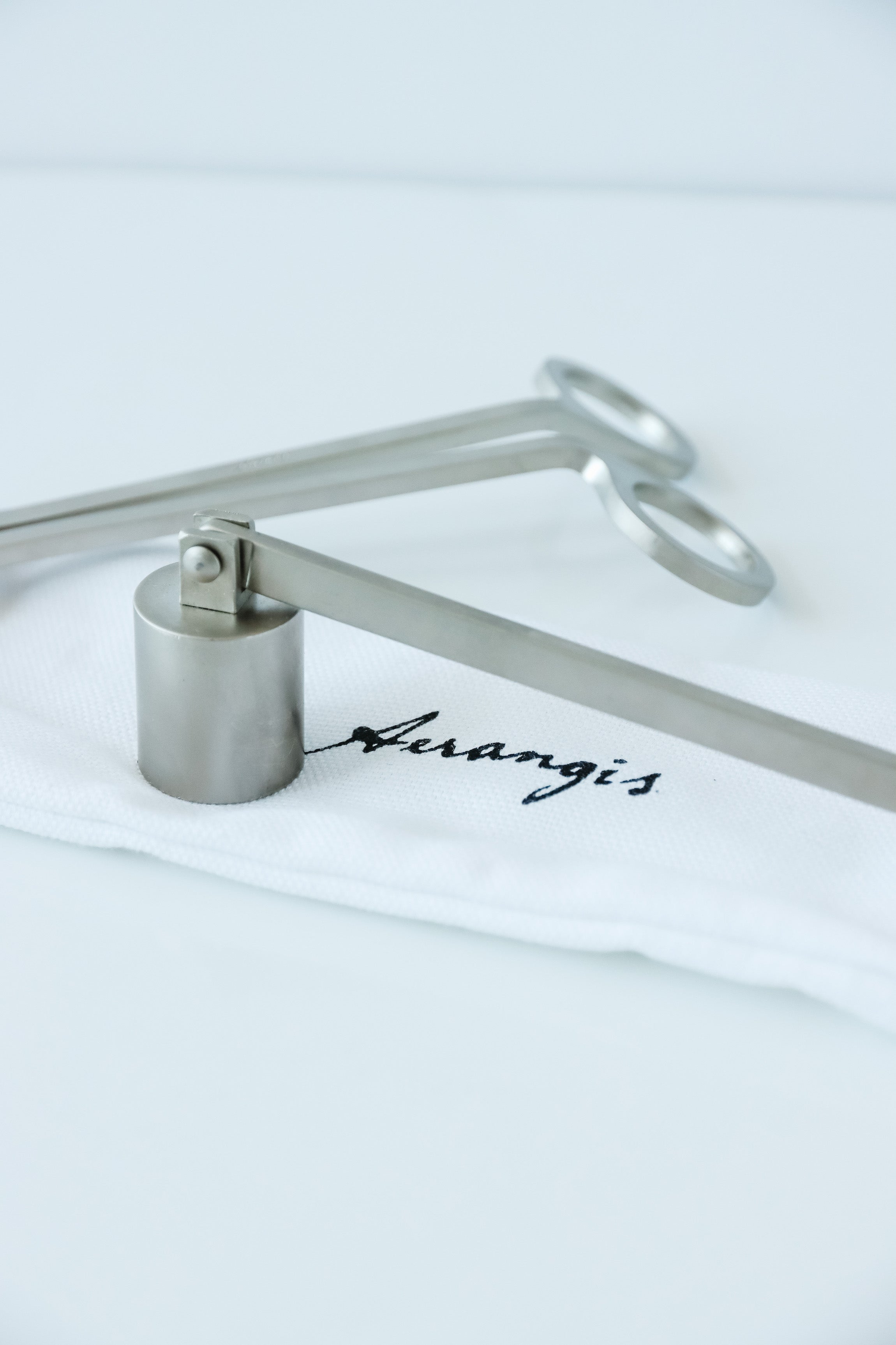 Aerangis Candle Snuffer – Stainless Steel Wick Care Tool with Cotton Storage Bag